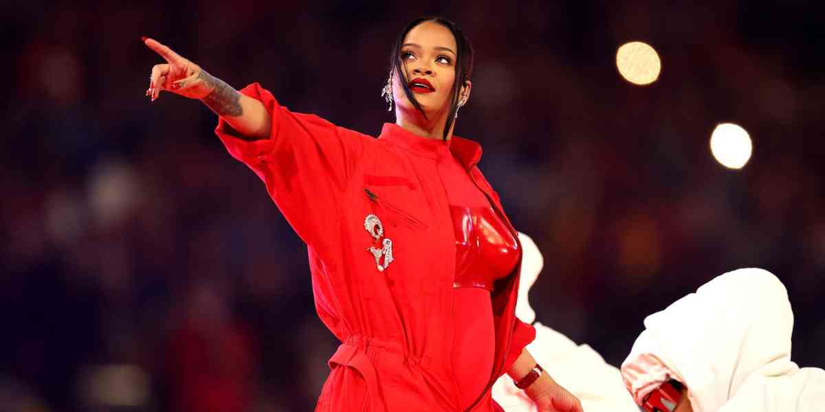 Rihanna Pregnant 2023 Rihanna reveals baby bump at Super Bowl performance
