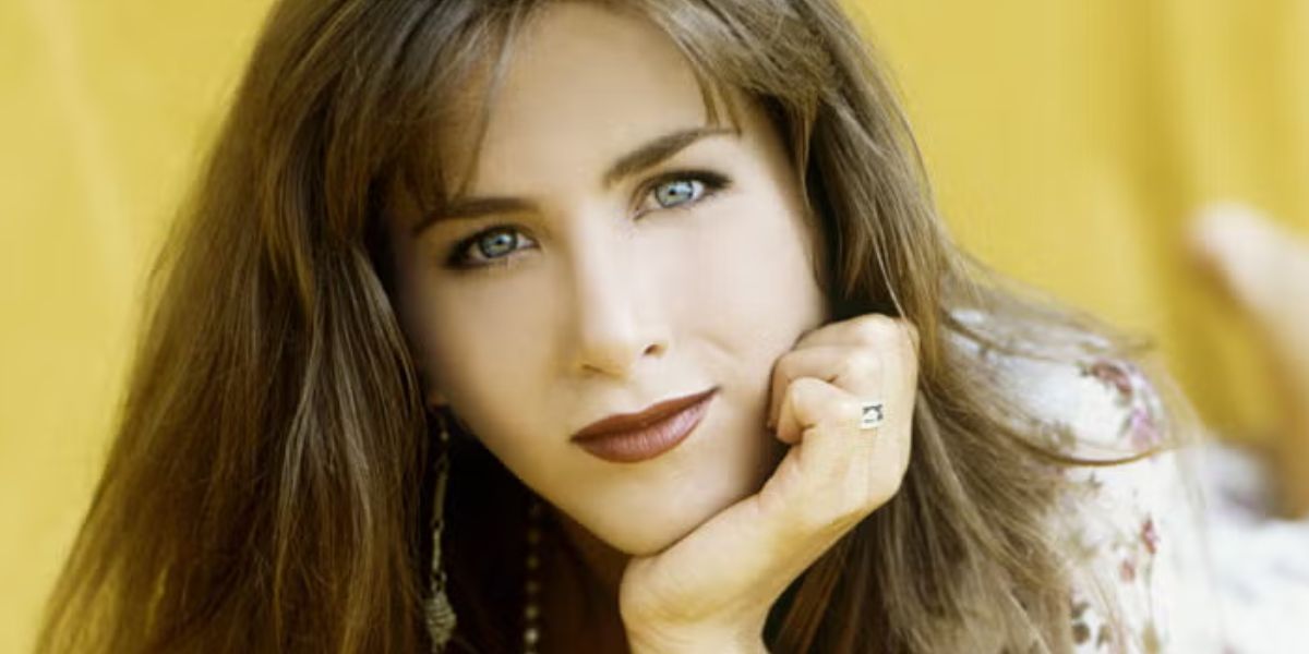 Jennifer Aniston Poses For A Portrait In 80s